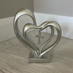 Double heart with cross resin statue